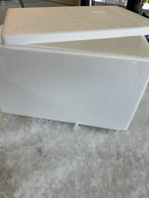 A styrofoam box with ice